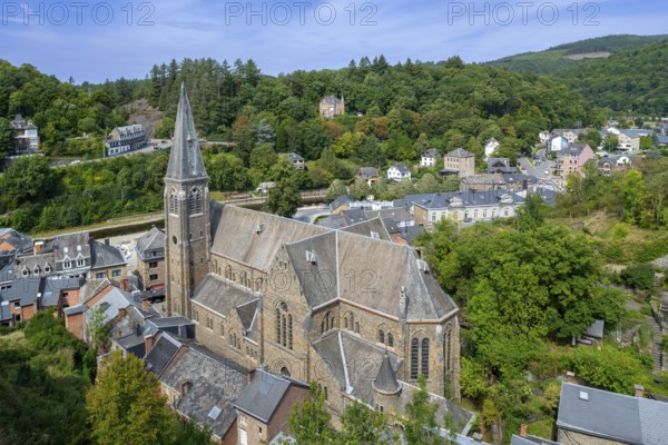 St. Nicholas Church seen from the castle ruins in the city La Roche-en-Ardenne in summer, province of Luxembourg, Ardennes, Wallonia, Belgium