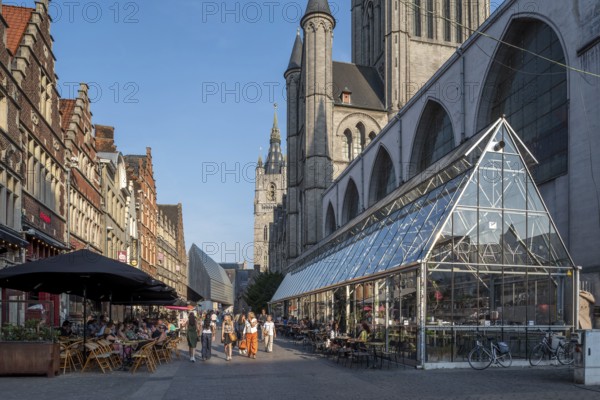 St Nicholas' church, Sint-Niklaaskerk, belfry and cafés in the alley Klein Turkije in the city Ghent, Gent in summer, East Flanders, Belgium