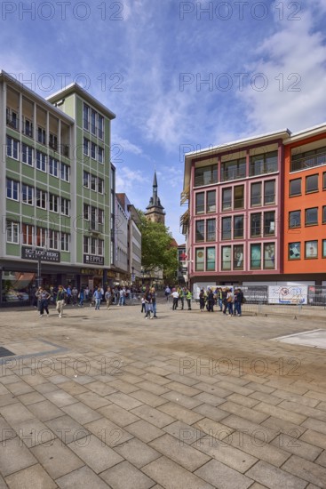 Square, general architecture, pavement slabs, trees, steeple of the collegiate church Stuttgart, retail shops, shopping, pedestrians as accessories, blue sky, cumulus clouds, cirrostratus clouds, intersection Kirchstraße with Kirchstraße, Stuttgart, state capital, city district Stuttgart, Baden-Württemberg, Germany
