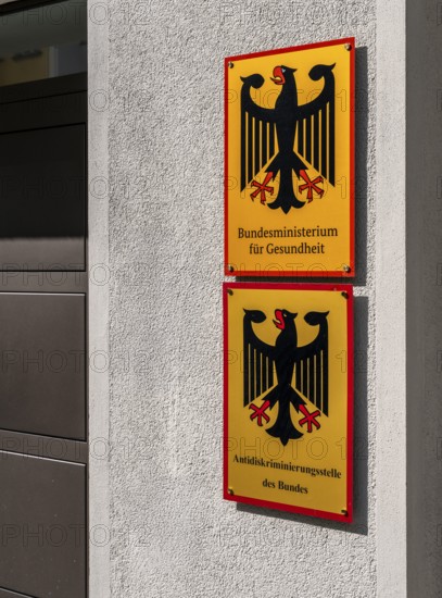 Yellow information signs, federal eagle with reference to federal ministries located there in the Berlin government district, Berlin, Germany