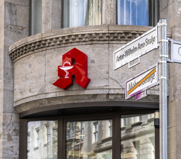 Red pharmacy symbol, former Mohrenstraße, Berlin, Germany