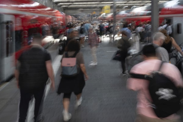 Travellers on the platform at Munich Central Station, Movement, Munich, Bavaria, Germany