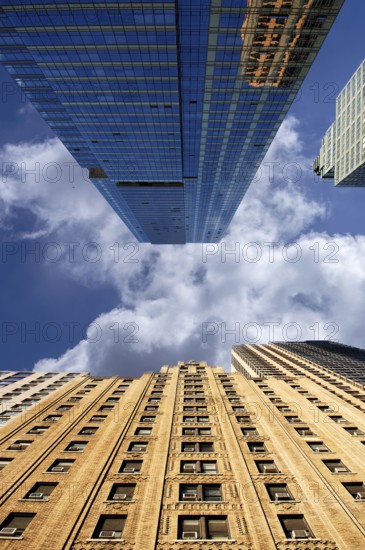 Skyscraper against the cloudy sky, New York City, USA