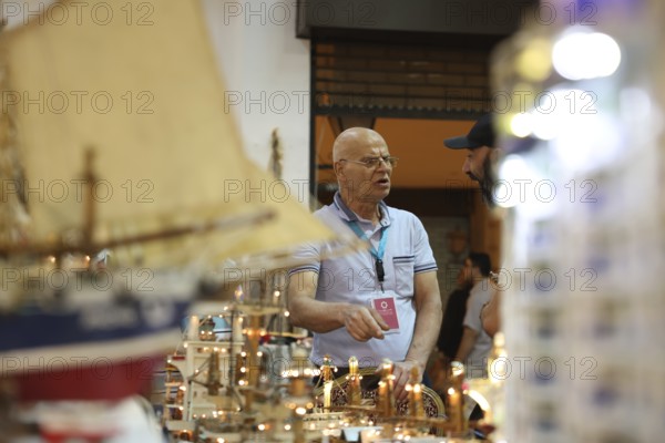 Syrian artisans display handmade artistic pieces to visitors at the Damascus International Fair. The exhibition features traditional crafts and creative works produced by local craftsmen as part of Syria's cultural and economic revival after years of conflict, Damascus, Damascus, Syria