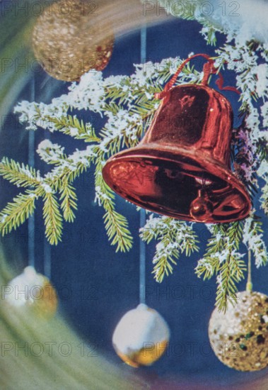 Old Christmas greeting card. Bell in branch of Christmas tree