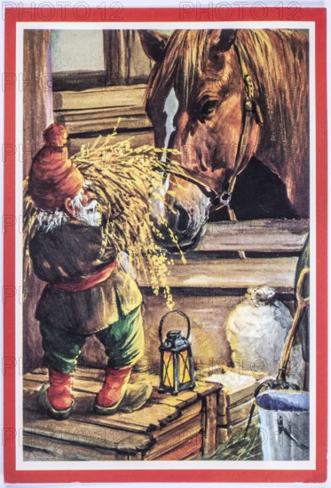 Old Christmas greeting card. Santa feeds horse in the stable
