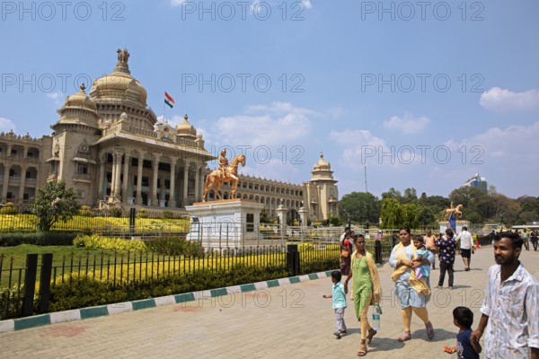 Indian families at the Vidhana Souda or Government Palace of Karnataka, Begaluru or Bangalore, Karnataka, India