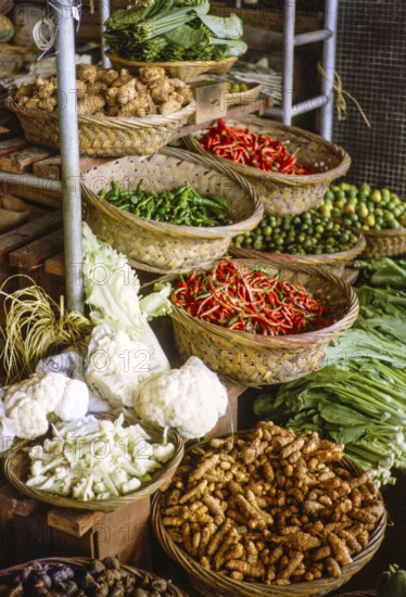 Market stall selling vegetables inside new market building, Johor Bahru, Jahor, Malaya, Malaysia, south east Asia, 1965