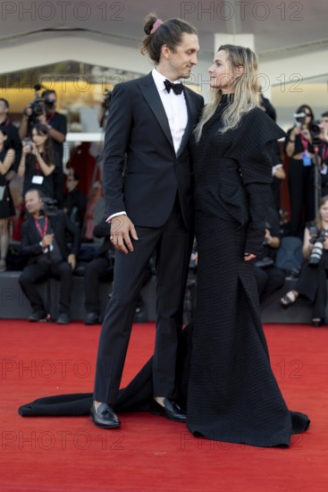 Venice, Italy - 2 September 2025: Rory St. Clair Gainer, Rebecca Ferguson during the Red Carpet of - A house of Dynamite - during the 82nd Venice International Film Festival