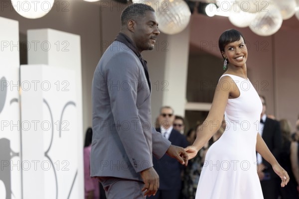 Venice, Italy - 2 September 2025: Idris Elba and Sabrina Dhowre Elba during the red carpet of - A house of Dynamite - during the 82nd Venice International Film Festival