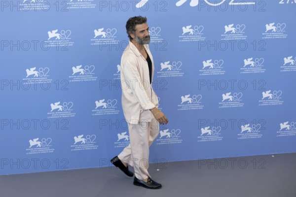 Venice, Italy - 3 September 2025: Oscar Isaac during the Photo Call of - In the Hand of Dante - during the 82nd Venice International Film Festival
