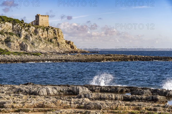 The Torre dell'Alto watchtower on the coast of the Porto Selvaggio nature reserve, Santa Caterina, Nardo, Apulia, Italy