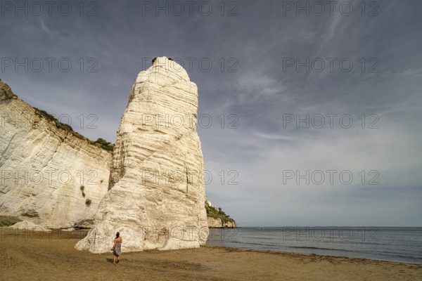 Pizzomunno rock on the Spiaggia di Castello beach in Vieste, Gargano, Apulia, Italy