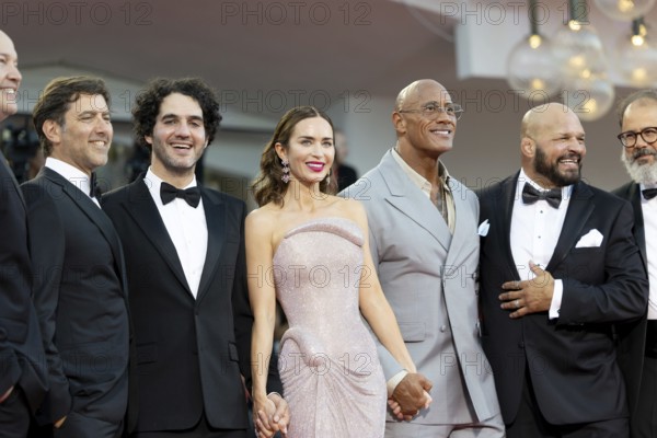 Venice, Italy - 1 September 2025: Emily Blunt, Benny Safdie, Andrea Romeo, David Koplan, Dwayne Johnson, Hiram Garcia and Mark Kerr during the Red Carpet of - The Smashing Machine - during the 82nd Venice International Film Festival