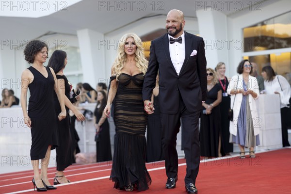 Venice, Italy - 1 September 2025: Franci Alberding Kerr and Mark Kerr during the Red Carpet of - The Smashing Machine - during the 82nd Venice International Film Festival