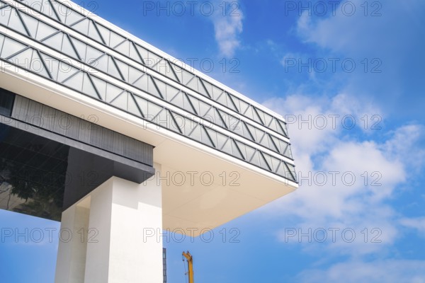 Modern building against a blue sky with geometric shapes, Medienbrücke, Munich, Germany