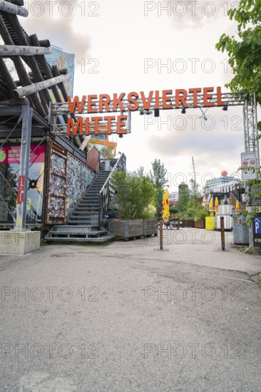 Entrance to creative urban area with eye-catching architecture and graffiti, Werksviertel Munich, Munich, Germany