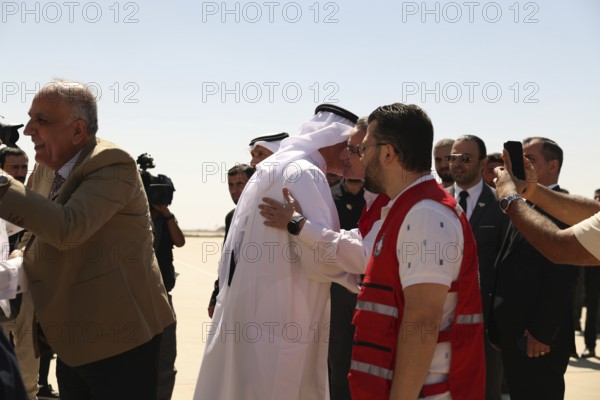 Officials from the Qatari and Syrian Red Crescents receive a Qatari airlift of aid to help the Syrian people, Damascus, Damascus, Syria