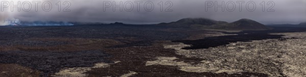 Lava, lava field, mountains, ash cloud, volcanic eruption, panorama, Sundhnúkur crater chain, July 2025, Reykjanes Peninsula, Iceland