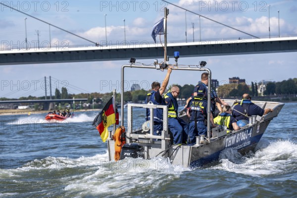 Multi-purpose boat of the THW during a training trip on the Rhine near Düsseldorf, the specialist group for water hazards, this type of boat is used to transport people and goods as a rescue boat and as a working platform, during the major exercise FÜLEX25, lasting several days, of the THW, Technical Relief Organisation, North Rhine-Westphalia regional association, over 3500 volunteers from the 127 North Rhine-Westphalia local associations practise many different deployment scenarios over 4 weekends
