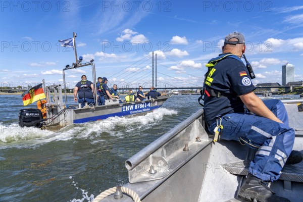 THW multi-purpose boats during a training trip on the Rhine, near Düsseldorf, of the Water Hazards Section, this type of boat is used to transport people and goods as a rescue boat and as a working platform, during the major exercise FÜLEX25, lasting several days, of the THW, Technical Relief Organisation, North Rhine-Westphalia Regional Association, over 3500 volunteers from the 127 North Rhine-Westphalia local associations practise many different deployment scenarios over 4 weekends