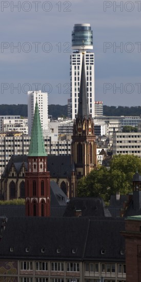 Tower of the old Protestant Church of St Nicholas, the Protestant Church of the Epiphany and the New Henninger Tower, Frankfurt am Main, Hesse, Germany