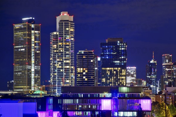 Rooftop day with colourfully illuminated houses for a techno party on the roof with a view of the skyline, Frankfurt am Main, Hesse, Germany