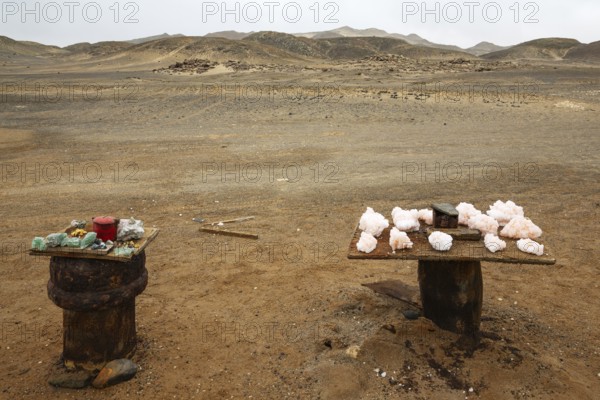 Salt crystals and semi-precious stones are for sale along the salt road in the Skeleton Coast. Namib Desert, Dorob National Park, Namibia