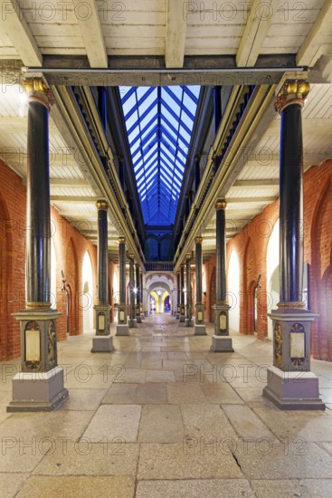 Night view, north-south passageway with columns and arcade gallery, two storeys, town hall construction started around 1300, secular building, Brick Gothic, Alter Markt, Old Town, UNESCO World Heritage Site, Hanseatic City of Stralsund, Mecklenburg-Western Pomerania, Germany