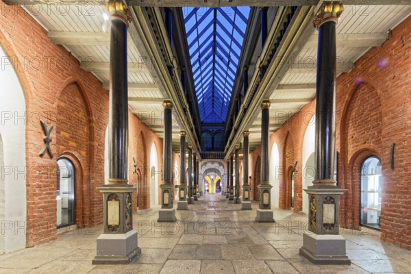 Night view, north-south passageway with columns and arcade gallery, two storeys, town hall construction started around 1300, secular building, Brick Gothic, Alter Markt, Old Town, UNESCO World Heritage Site, Hanseatic City of Stralsund, Mecklenburg-Western Pomerania, Germany