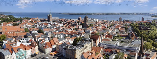 Panorama, view from 84 metres above the city, bottom left Neuer Markt, rear left St. Nikolai Church, centre cultural church St. Jakobi, rear island of Rügen, St. Marien Church, basilica, late Gothic, three-aisled with transept, first mentioned in 1298, Neuer Markt, Old Town, UNESCO World Heritage Site, Hanseatic City of Stralsund, Mecklenburg-Western Pomerania, Germany