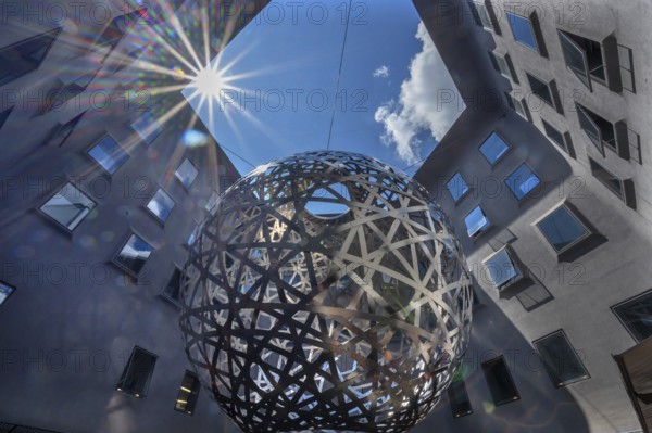Steel sphere, Sphere, a work of art by Ólafur Eliasson, Fünf Höfe shopping arcade, Munich, Bavaria, Germany
