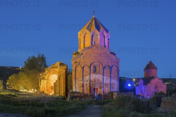 Illuminated church ruins in the evening light, surrounded by natural landscape, Marmashen Monastery at dusk, blue hour, Marmashen Vank, Shirak Province, Armenia