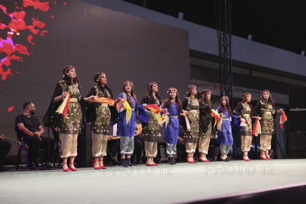 A Kurdish traditional dance troupe performs during the Damascus International Fair, the first edition held after the fall of Bashar al-Assad, showcasing cultural heritage and attracting visitors to the exhibition, Damascus, Damascus, Syria