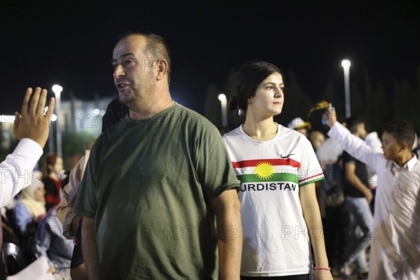 Young Kurdish woman visiting the first Damascus International Fair after Assad's fall, Damascus, Damascus, Syria