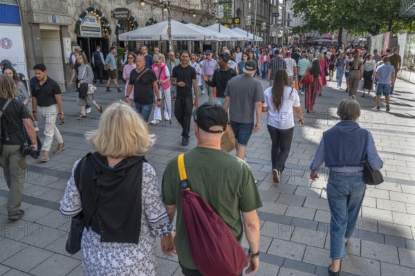 Strolling tourists in the pedestrian zone, Neuhauser Str, Munich, Bavaria, Germany