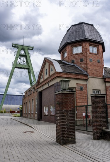 The former Lohberg coal mine in Dinslaken, now a leisure, work and residential quarter, Lohberg creative quarter, pithead frame of shaft 2, freshly renovated, North Rhine-Westphalia, Germany