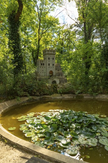 Water lily pond with bee castle in the spa gardens of Baden, Lower Austria, Austria