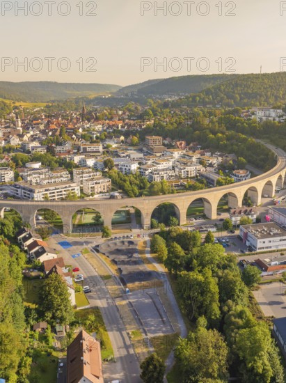 Viaduct running through an urban area over hills and through natural landscape, small town of Perle Nagold, Black Forest, Germany