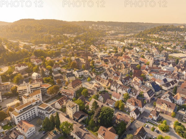 Panoramic view over a town in sunshine with visible church and historic buildings, small town pearl Nagold, Black Forest, Germany