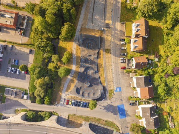 Top view of a pump track with surrounding buildings and green surroundings, pump track, Nagold, Black Forest, Germany