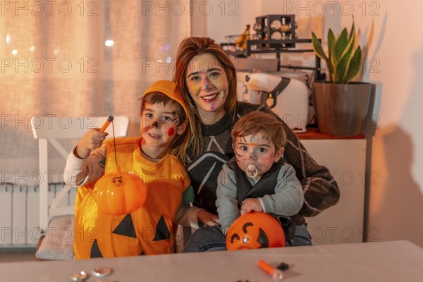 Family celebrating halloween together, wearing costumes and face paint, creating a warm and festive atmosphere