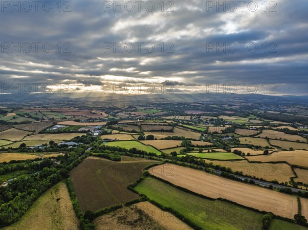 Sunset of Fields and Farms over Devon from drone, Torquay, Torbay, Devon, England, United Kingdom