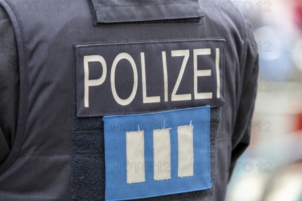 Symbolic image police operation: close-up of a police officer on duty