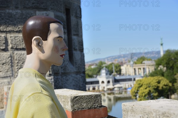 Mannequin enjoys the panoramic view of budapest from the historical buda castle, showcasing the city's beauty and the charm of the vantage point