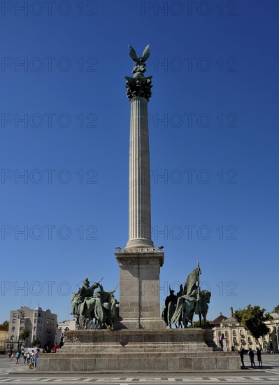 Millennium monument celebrating 1000 years of hungary, featuring archangel gabriel statue, equestrian statues, and blue sky
