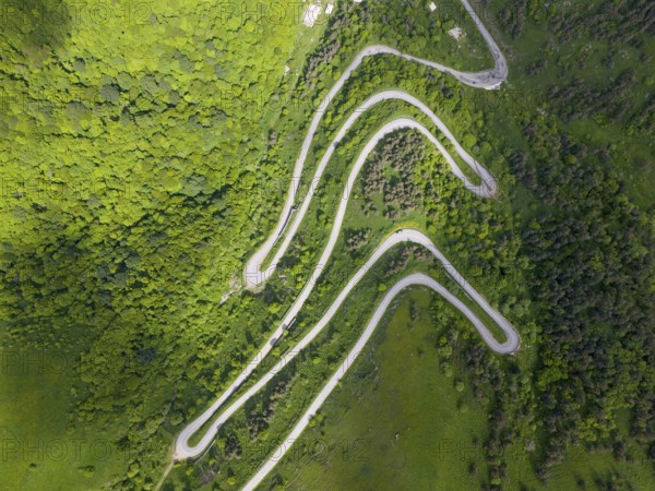 Winding road through green hills and forests, aerial view, road H52 above a tunnel, Dilijan, Dilijan, Delijan, Delijan, Dilijan National Park, Tavush Province, Tavush, Armenia