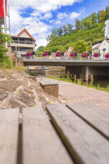 Small town bridge decorated with summer flowers in an urban setting, small town pearl Calw, Black Forest, Germany