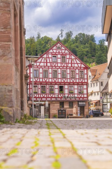 Historic half-timbered house in a cobbled street with picturesque architecture, small town pearl Calw, Black Forest, Germany