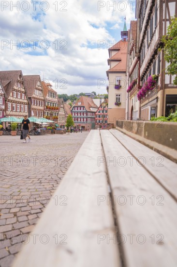 Half-timbered houses from an unusual perspective with a view of the sky, small town of Perle Calw, Black Forest, Germany